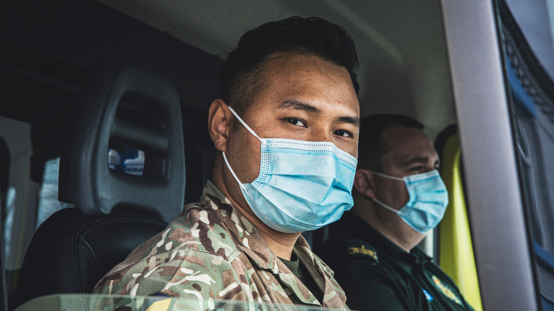 Military personnel in ambulance
