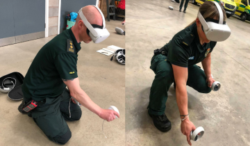 Paramedics with virtual reality headsets testing training with them.