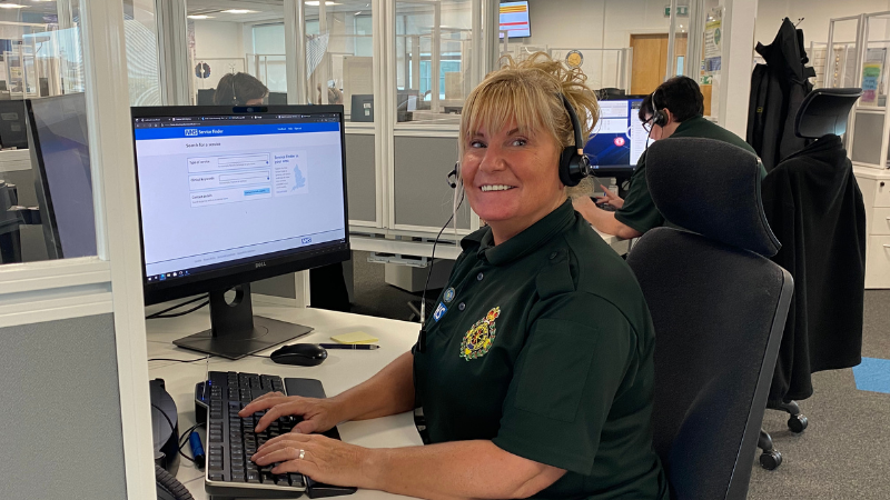 111 health advisor sat her computer in the control centre