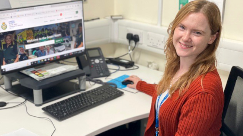 Communications Assistant Amy smiling to camera