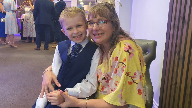 Photo of a young boy and his mum 