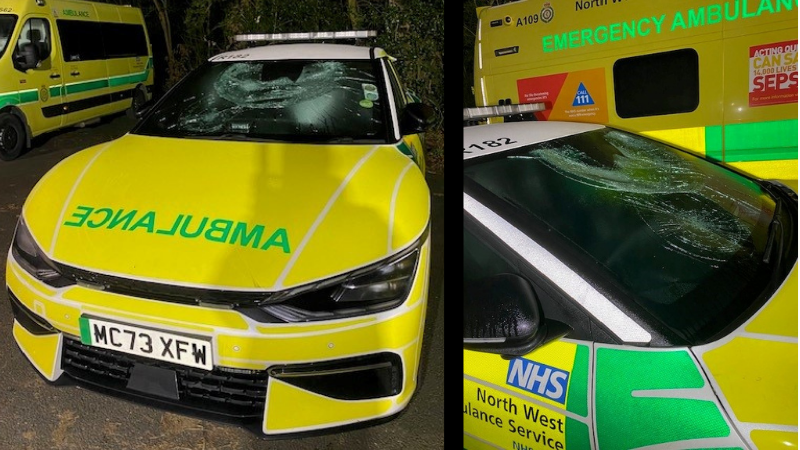 Two images of a vandalised RV. One front on with a smashed windscreen. Second photo of a side profile of the damaged window.