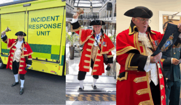 Three images of a town crier in traditional red and gold regalia. From left to right: standing in front of an Incident Response Unit vehicle, ringing a bell in a shopping centre, and reading from a scroll in an indoor event.