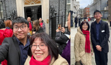 Left: A group of people stand and take photos in front of Number 10 Downing Street door. The focus is on Bati and Shirley in the foreground, smiling, with several others visible in the background. Right: Shirley and Bati stood on a street in London smiling at the camera.