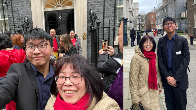 Left: A group of people stand and take photos in front of Number 10 Downing Street door. The focus is on Bati and Shirley in the foreground, smiling, with several others visible in the background. Right: Shirley and Bati stood on a street in London smiling at the camera.