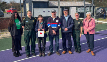 Group photo of members of NWAS staff, the NWAS Charity and Garstang Tennis Club members, including David and his wife.