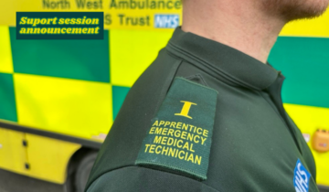 The image shows a close-up of a uniformed shoulder with a patch that reads "Apprentice Emergency Medical Technician." The background includes a blurred NHS logo on a vehicle.