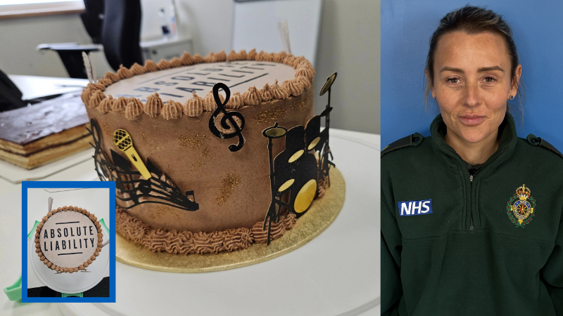 Winning cake and staff member